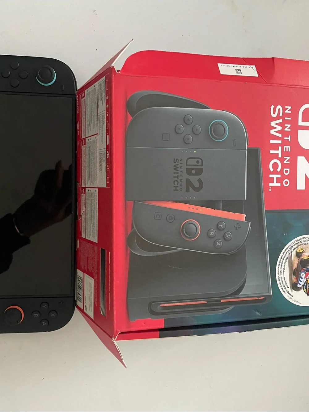 Nintendo Switch Handheld Console Black with Blue and Orange Accent Rings
